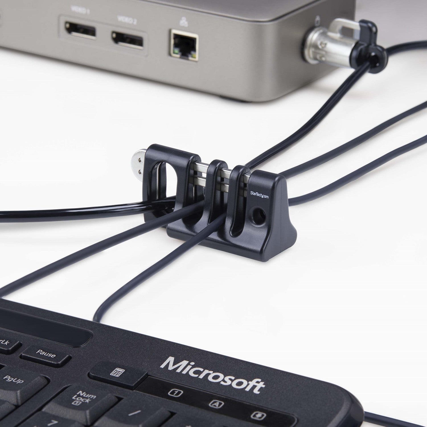 StarTech.com Blocco di sicurezza per cavi delle periferiche, tastiera/mouse, blocco per cavi per uffici/computer condivisi compatibile con cavo/padlock di sicurezza per laptop - TAA